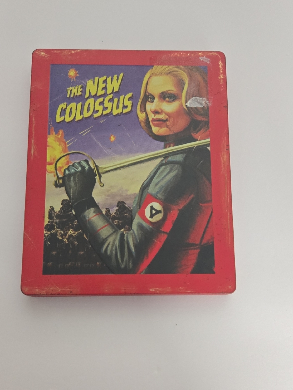 The New Colossus Red Illustrated Metal Tin